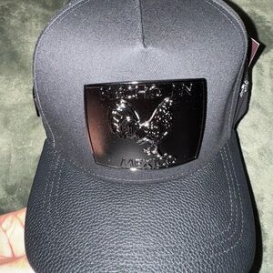 Black Cap with Rooster Emblem